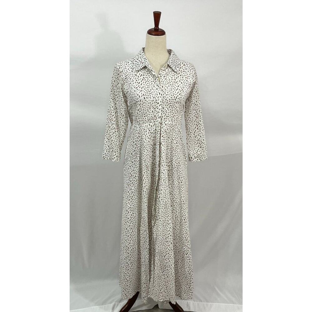 Brown and white spotted maxi shirt dress with a relaxed, flowing fit